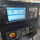 纽威龙门加工中心.工作台2X4米，门宽3.2米，主轴行程1.